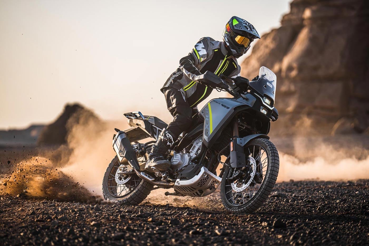 Rally rider on a 450 adventure bike in the desert