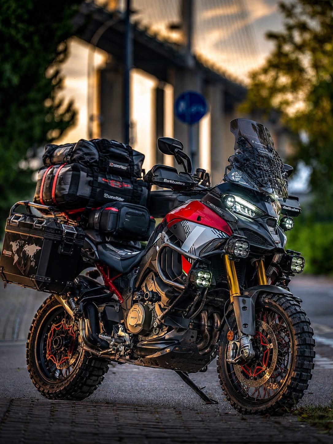 Ducati Multistrada V4 Rally fully loaded at golden hour