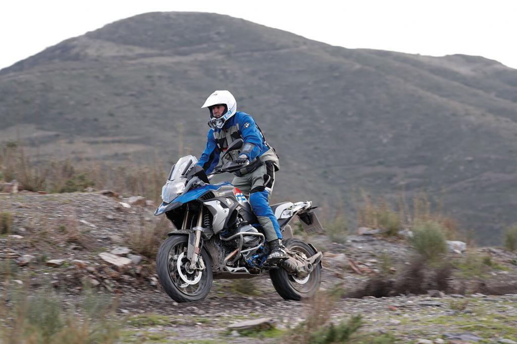BMW R 1200 GS lifting front wheel on rocky terrain